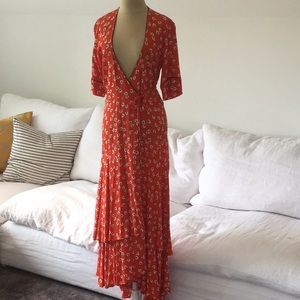 Orange crep dress with flowers and 3/4 sleeves